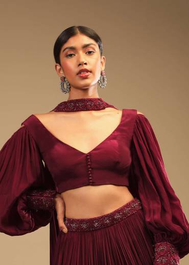Maroon Lehenga In Crepe With Embroidery Detailing On The Waist And Bishop Sleeved Crop Top