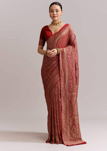 Maroon Silk Woven Brocade Saree With Zari And Floral Border