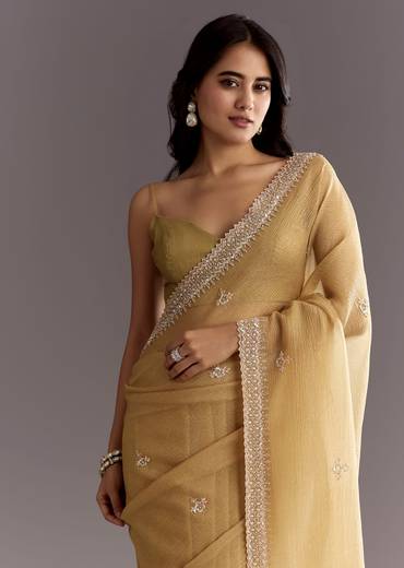 Mehendi Green Crushed Tissue Saree With Cutwork Embroidered Border