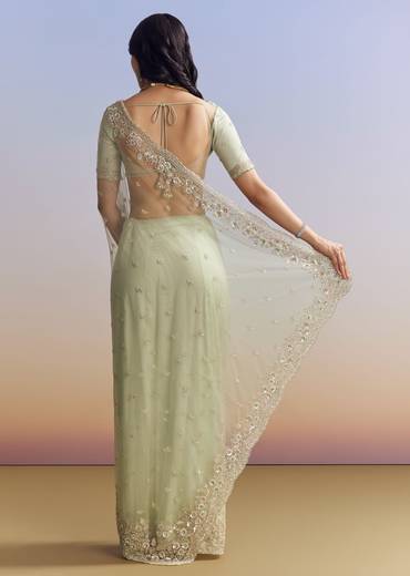 Mint Green Net Saree With Scallop Border And Heavy Embroidery