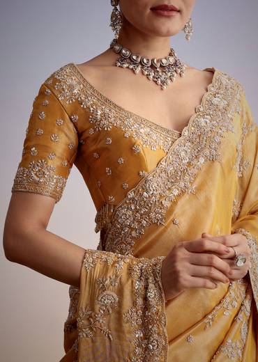 Mustard Yellow Silk Saree With Heavily Embroidered Pallu And Border