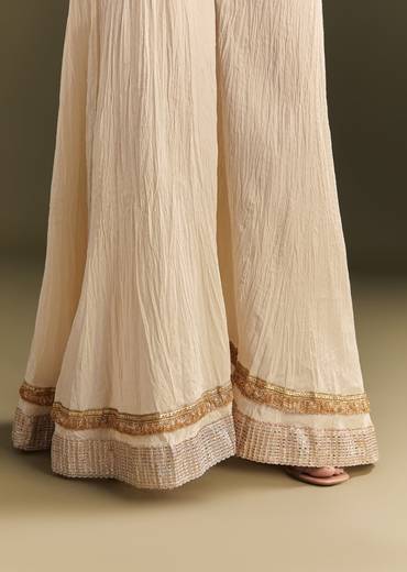Off White Cora Cotton Asymmetrical Kurta Palazzo With Net Dupatta