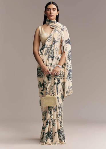 Off White Crepe Saree With Black Floral Print And Embroidered Border