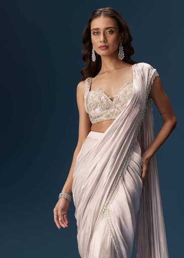 Off White Saree With Embroidered Blouse