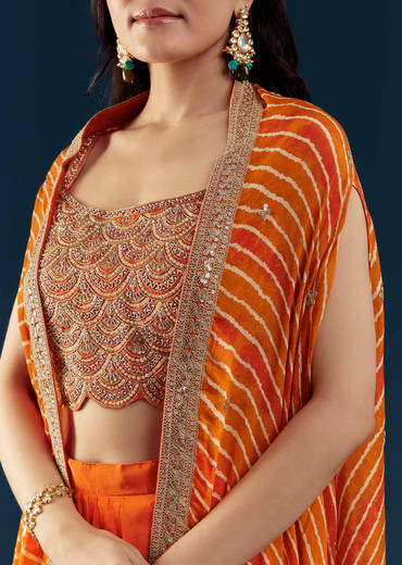 Orange Asymmetric Crop Top Skirt Set with Leheriya Cape