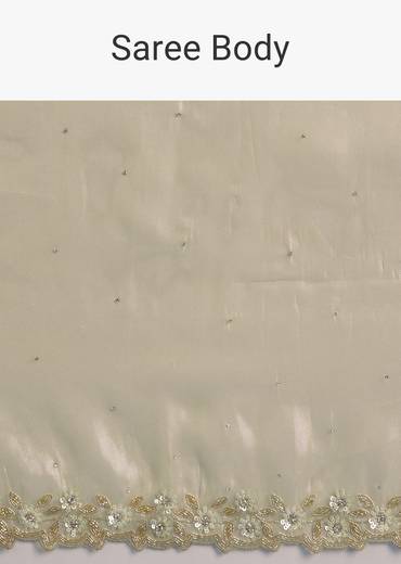 Pastel Green Glass Tissue Saree With Floral Embroidery And Cutwork Border