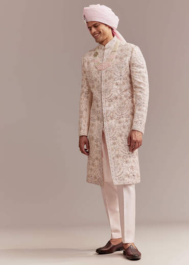 Pastel Pink Silk Sherwani For Groom With Intricate Embroidery