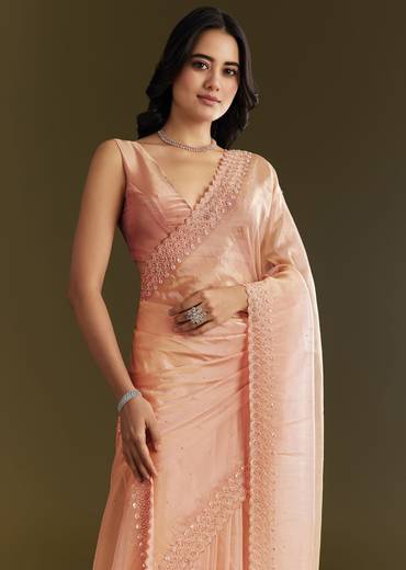 Peach Organza Saree With Stone Embellishment And Scallop Border