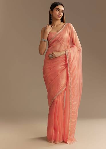 Peach Tissue Saree With Stones Cutdana Embellishments And Scallop Border