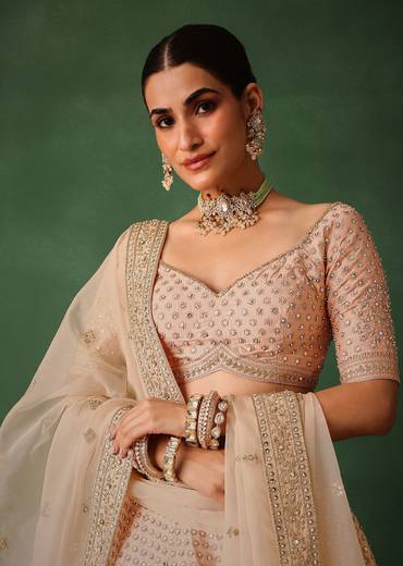 Peach Raw Silk Lehenga Set With Hand Embroidery