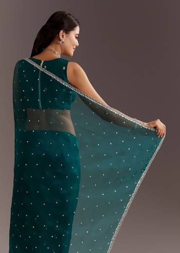 Teal Green Glass Tissue Saree With Cutdana And Sequins Scallop Border