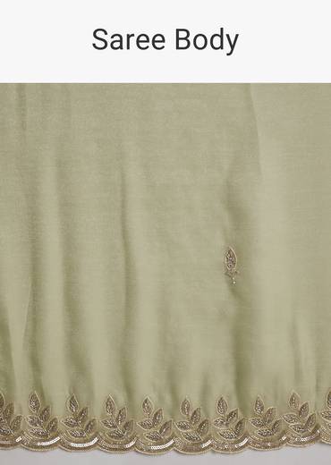 Pista Green Tissue Saree With Leaf Motif Embroidery In Sequins And Cutdana