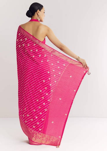 Rani Pink Leheriya Print With Floral Gotapatti And Moti Embroidery.