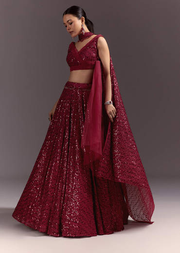 Red Lehenga Set With Embellished Dupatta And Tassels
