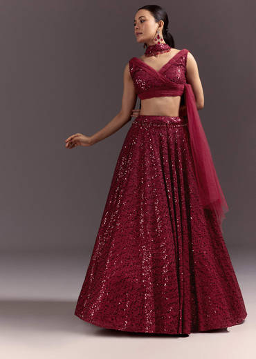 Red Lehenga Set With Embellished Dupatta And Tassels