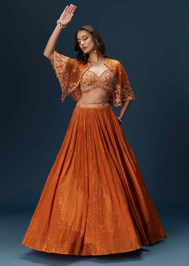 Rust Orange Embroidered Lehenga With Dramatic Cape And Blouse