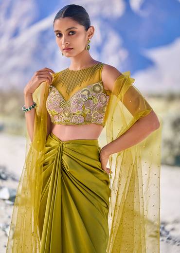 Green Satin Drape Skirt With Embroidered Blouse And Net Cape