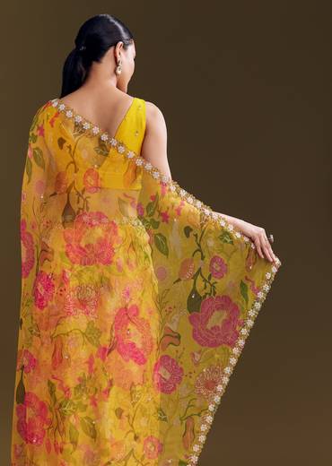 Sunny Festive Couple Set – Yellow Organza Floral Saree With Beaded Border For Her And Orange Tie-Dye Jacket Kurta Set With Mirror Work For Him