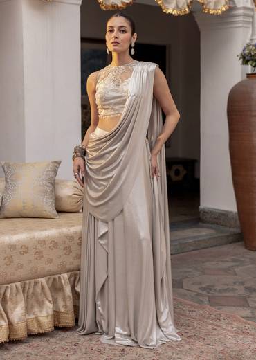 Ivory Lycra Draped Saree With Embroidered Blouse