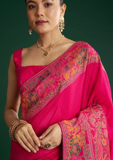 Rani Pink Dola Silk Woven Saree With Floral And Animal Prints
