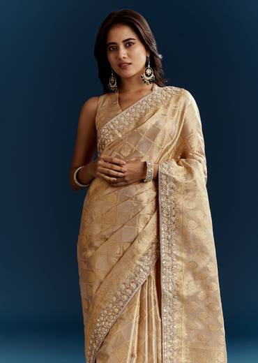 Gold Tissue Brocade Saree With Tassels And Gota Patti Moti Embroidery