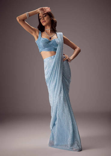 Sky Blue Shimmer Saree Paired With A Sweetheart Velvet Blouse