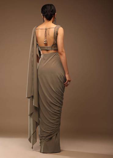 Taupe Grey Ready-Pleated Saree With A Crop Top In Foil Applique Embellishment Sleeveless With A Tie-Up Tassel Dori At The Back.