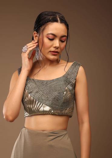 Taupe Grey Ready-Pleated Saree With A Crop Top In Foil Applique Embellishment Sleeveless With A Tie-Up Tassel Dori At The Back.