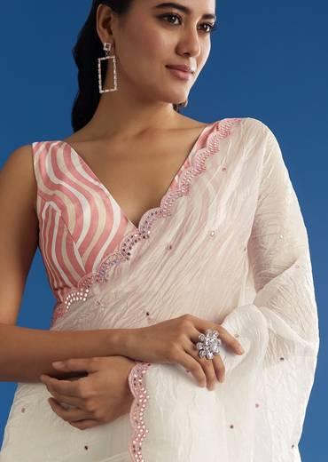 White Crepe Silk Saree With Mirror Scallop Border And Pink Contrast Blouse