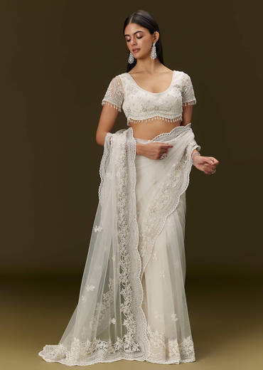 White Net Saree With All Over Embroidery