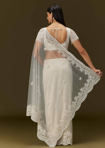 White Net Saree With All Over Embroidery