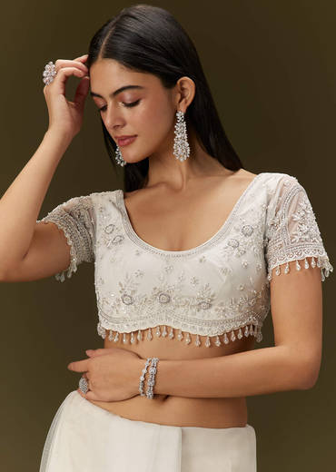 White Net Saree With All Over Embroidery