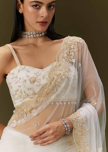 White Net Heavy Embroidered Saree With Embellished Border