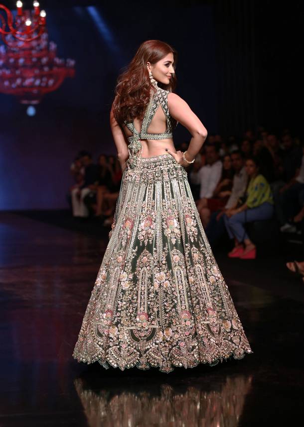 Palace Green Lehenga Choli In Velvet With Multi Colored Hand Embroidered Heritage Kalis With Hints Of Flowers