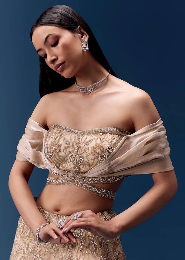 Ivory Off Shoulder Draped Blouse with Embellished Lehenga