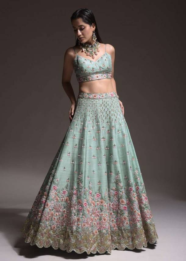 Sage Green Lehenga Choli In Raw Silk With Vibrant Resham Embroidered Cluster Of Summer Blooms And Buttis