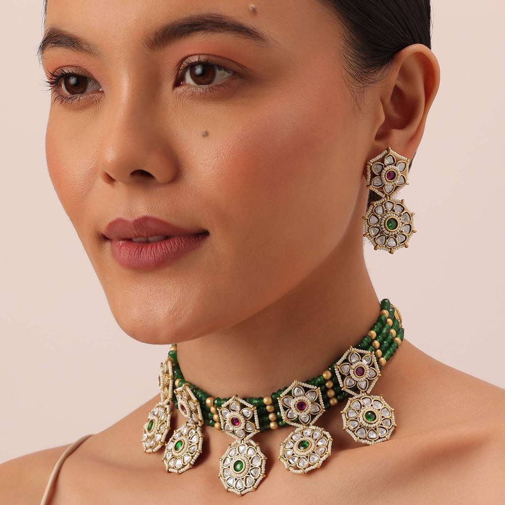 Green Temple Choker Set With Floral Motifs And Meenakari Detail