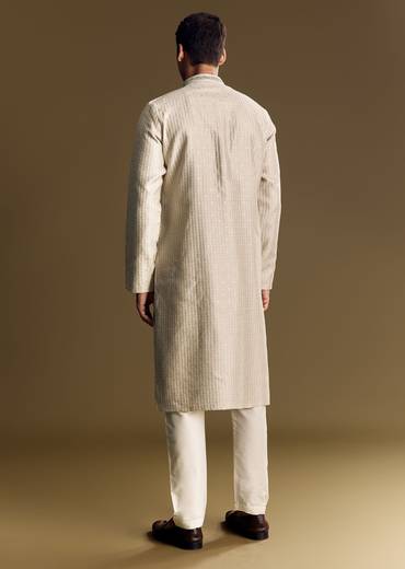 Beige Banarasi Jacquard Kurta Set With Intricate Cutwork