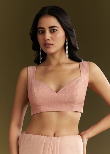 Beige Crushed Tissue Saree With Stone Embellishment And Glossy Finish