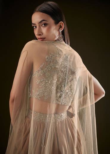 Beige Drape Dhoti Skirt With Embroidered Bustier And Long Cape