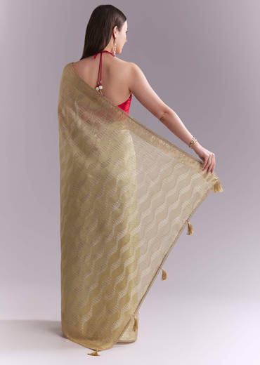 Cream Tissue Saree With Subtle Weave And Zari Border