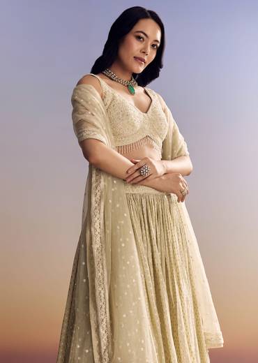 Cream White Banarasi Lehenga Set With Cut Dana Choli