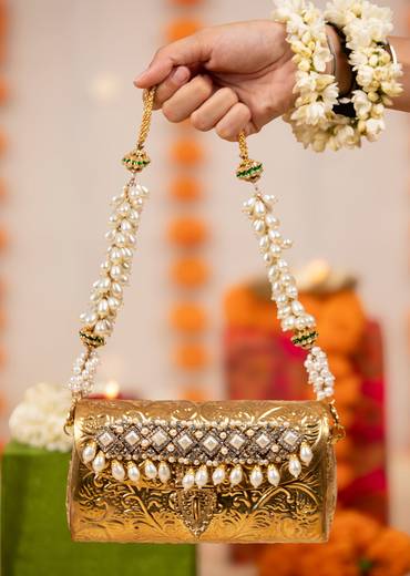 Gold Kundan and Pearl Embellished Metal Bag