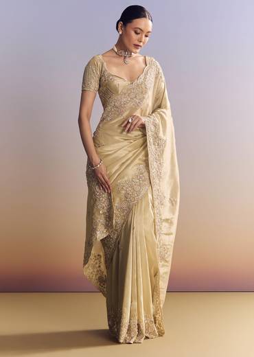 Gold Tissue Silk Saree With Scallop Border And Rich Embroidered Unstitched Blouse