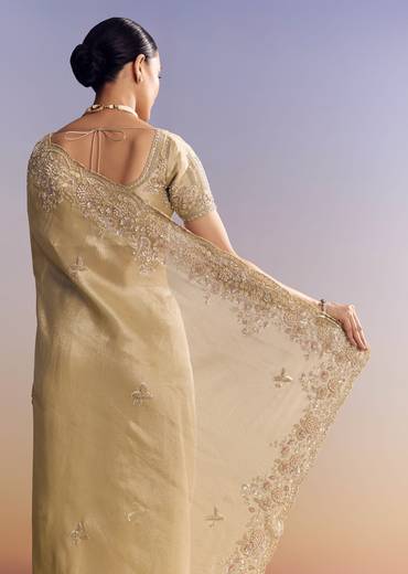 Gold Tissue Silk Saree With Scallop Border And Rich Embroidered Unstitched Blouse