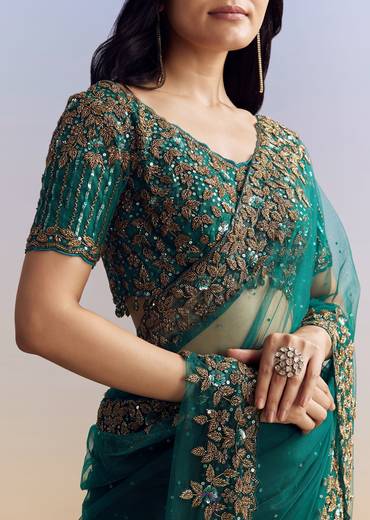 Green Net Saree Featuring Heavy Embroidered Border