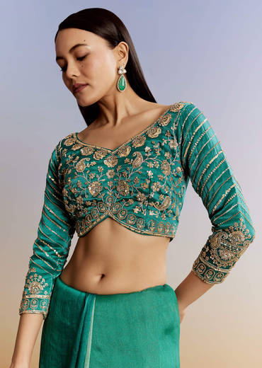 Green Shaded Tissue Saree With Floral Embroidery And Sequins Blouse