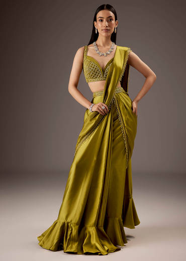 Green Silk Saree With Elegant Bead Work And Frills