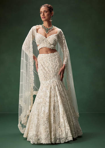 Ivory Mermaid Bridal Lehenga With Full Sleeves And Heavy Embroidery