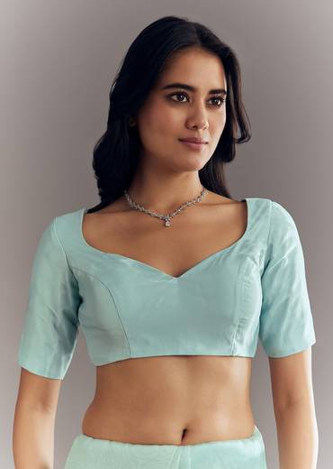 Light Blue Glass Tissue Saree With Stone Embroidery And Scallop Border